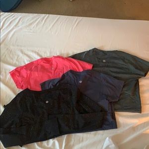 Four lululemon shirts (Black one is long sleeve)